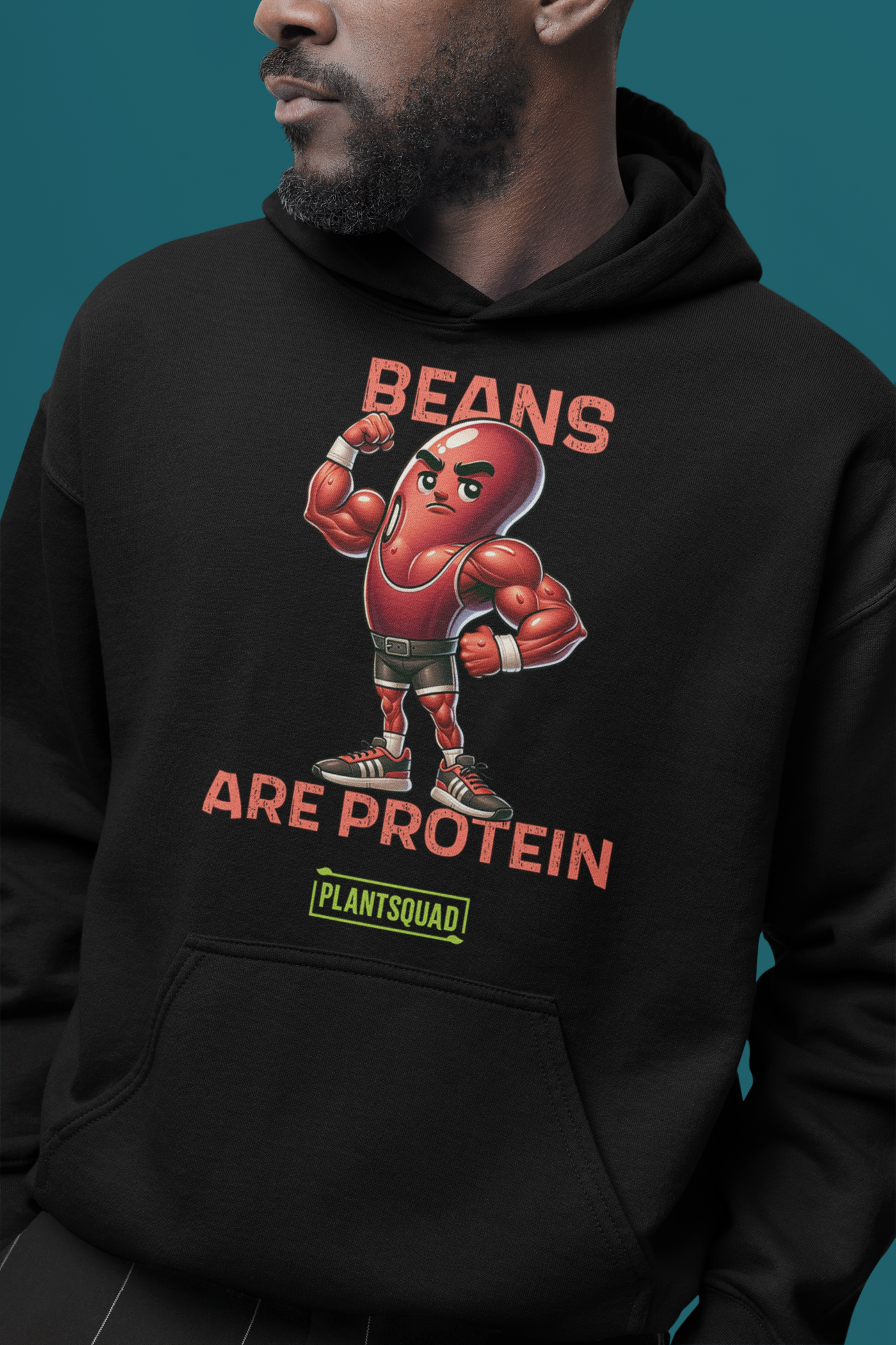 A black hoodie featuring a graphic of a muscular, anthropomorphic bean character in boxing gear, with the text "Beans Are Protein" in bold red letters above and below the image. Embrace your vegan lifestyle with this Plantsquad Kidney Bean "Beans Are Protein" - Unisex Hoodie. Below the text is a small green rectangle with the word "PLANTSQUAD.