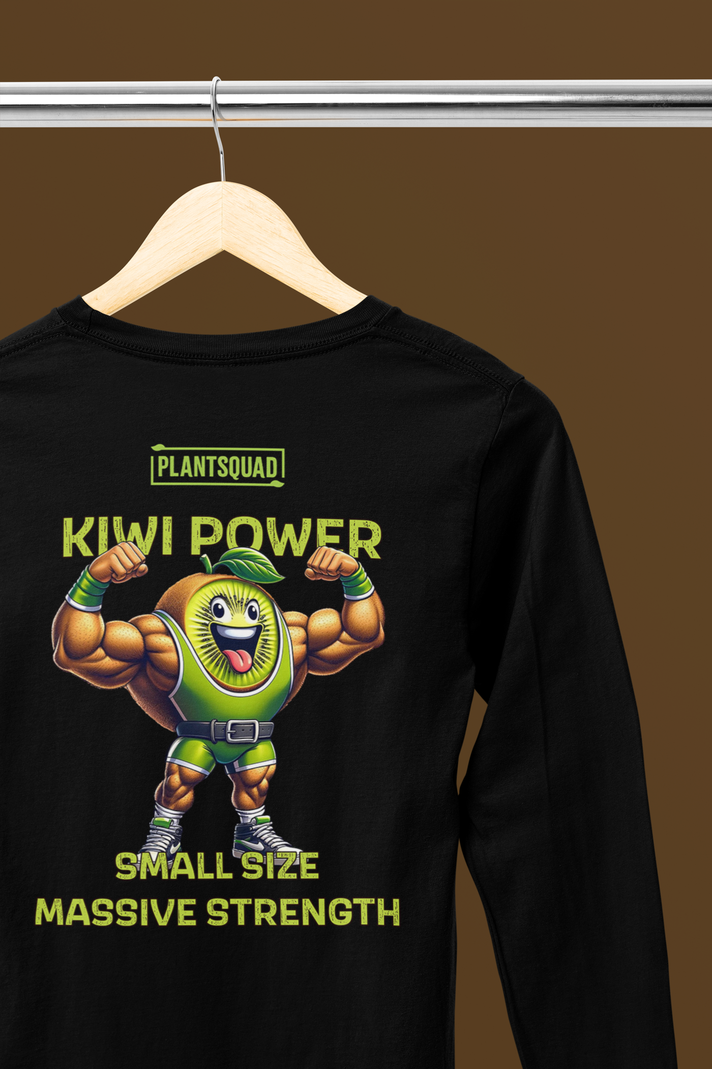 Black long-sleeve shirt featuring a muscly kiwi cartoon flexing its muscles. Above the character, the text reads "PLANTSQUAD," and below, it says "KIWI POWER." Further down, the text reads "SMALL SIZE MASSIVE STRENGTH" in bold yellow letters—a perfect fit for fitness enthusiasts embracing a vegan lifestyle. Introducing the Plantsquad Kiwi "Kiwi Power Small Size Massive Strength" - Unisex Long Sleeve T-Shirt.