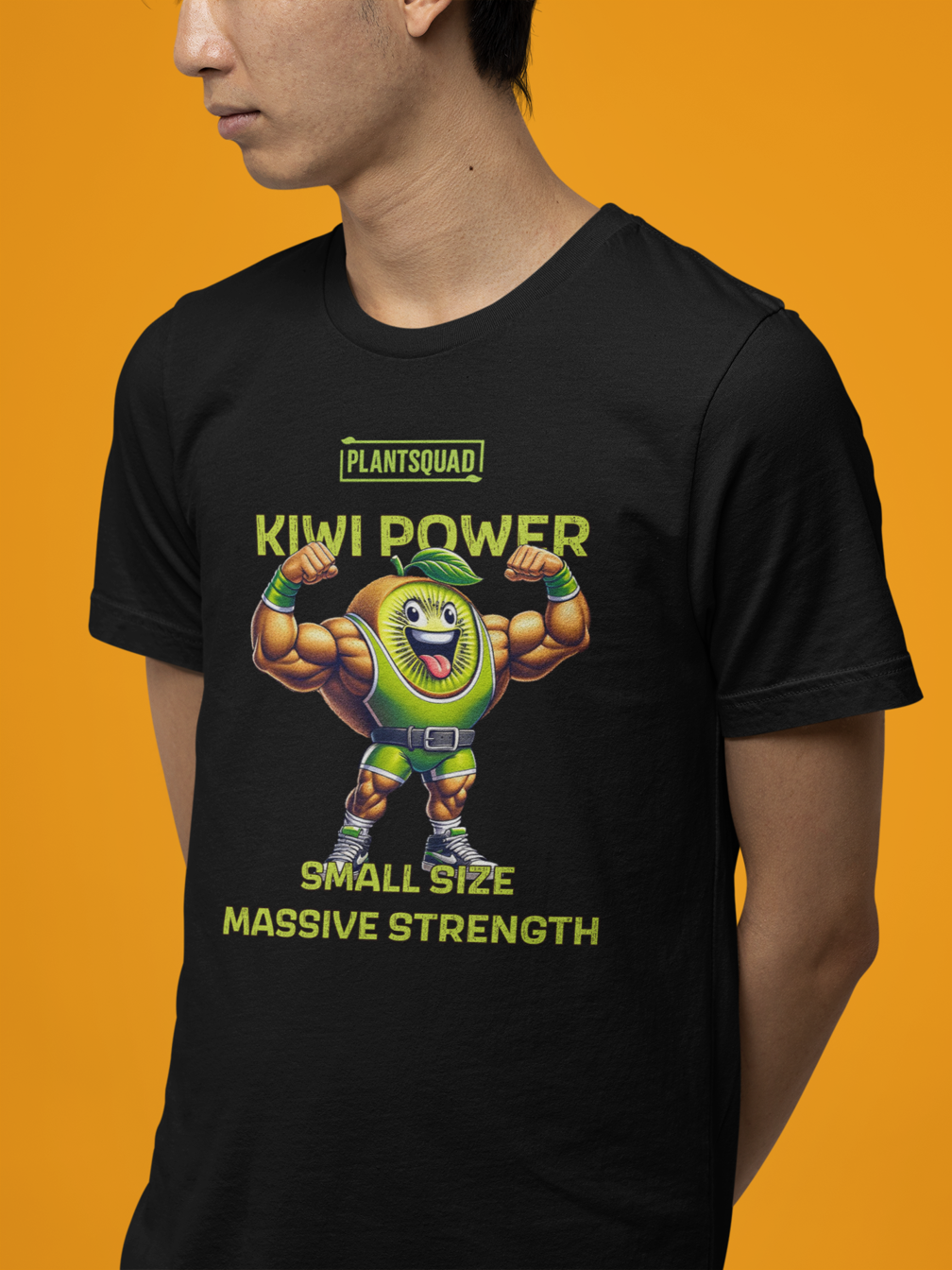 A Plantsquad Kiwi "Kiwi Power Small Size Massive Strength" - Unisex T-Shirt featuring a muscly kiwi cartoon character flexing its arms. Above the character, the text reads, "PLANTSQUAD KIWI POWER." Below the character, the text reads, "SMALL SIZE MASSIVE STRENGTH," perfect for a vegan lifestyle vibe.