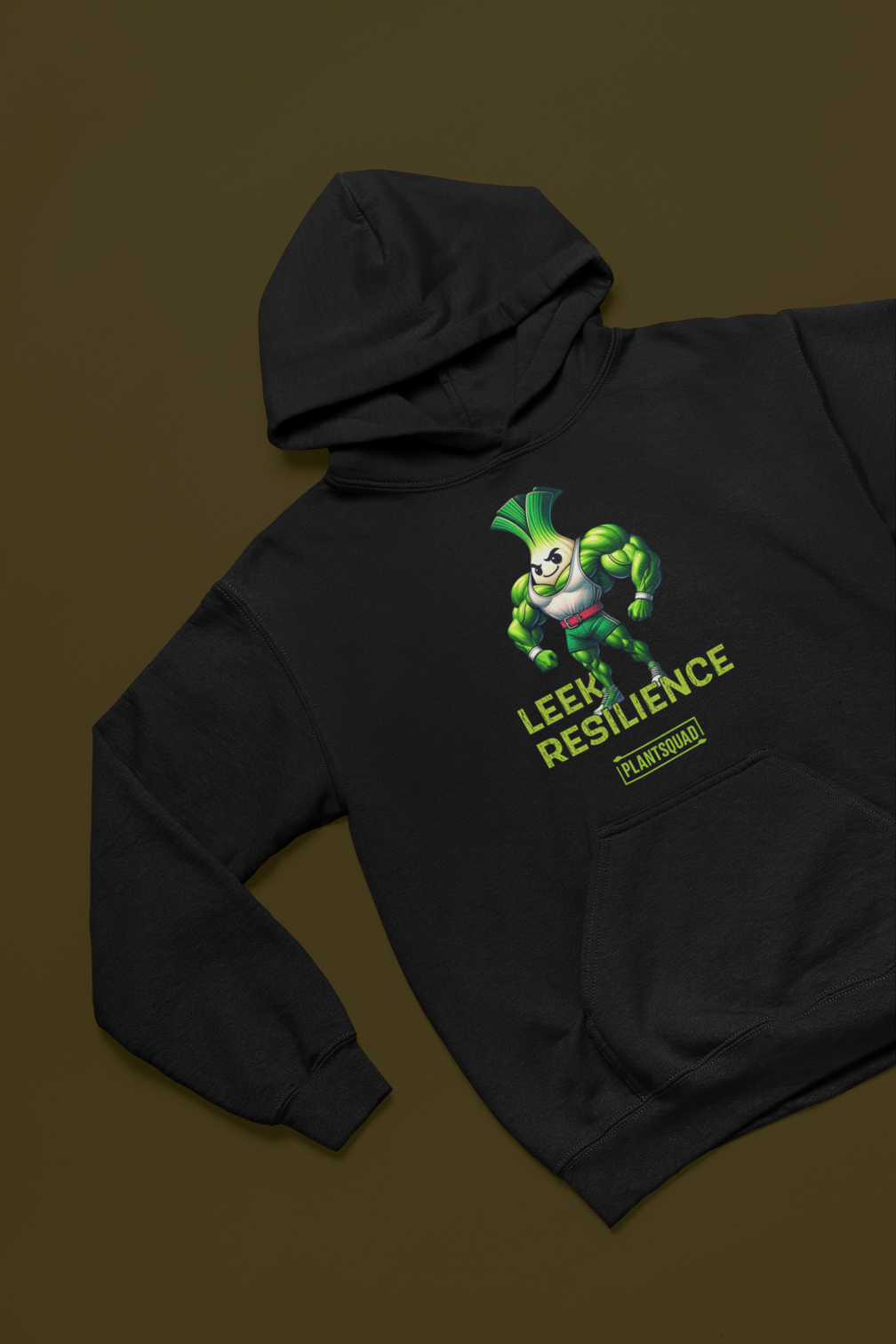 A black *Plantsquad Leek "Leek Resilience" - Unisex Hoodie* featuring an animated muscular leek character. The leek, with muscular arms and a confident pose, is accompanied by the text "Leek Resilience" above and "Plantsquad" below. Made from cozy fabric, this hoodie is perfect for those embracing a vegan lifestyle.