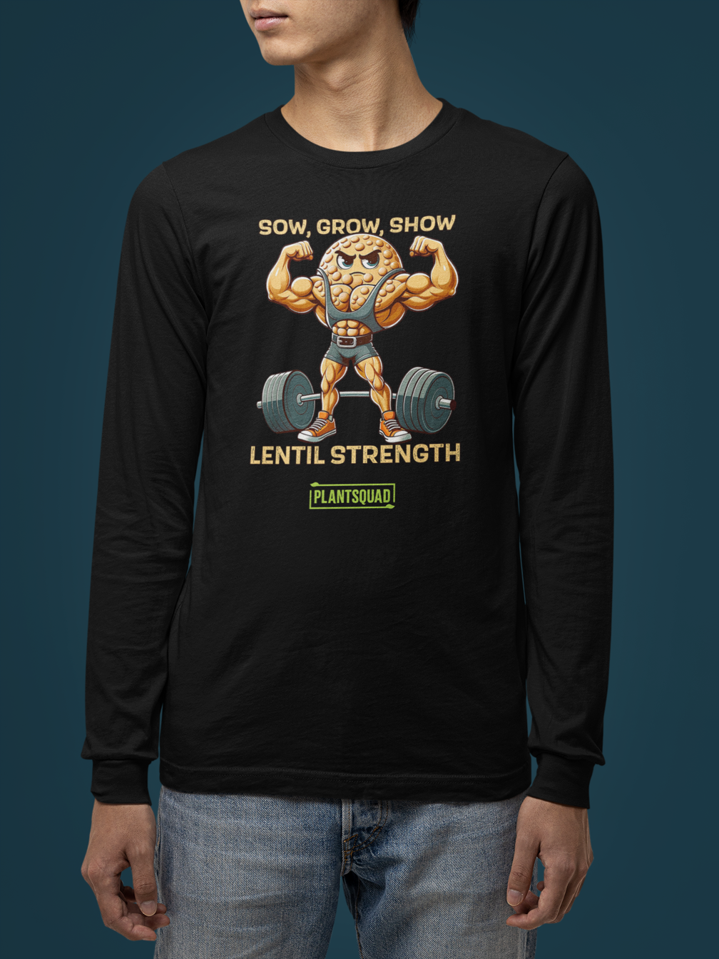 Plantsquad Lentil "Sow Grow Show Lentil Strength" - Unisex Long Sleeve T-Shirt showcasing a muscly lentil cartoon lifting a barbell. The text around the image reads, "Sow, Grow, Show Lentil Strength." Perfect for fitness enthusiasts and fans of the vegan lifestyle alike. Below the text is the logo "PLANTSQUAD".