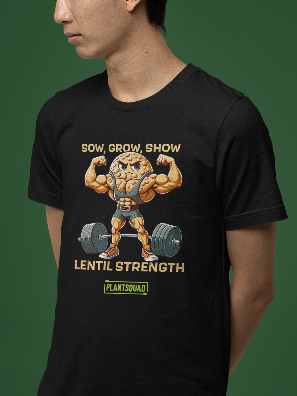 Plantsquad Lentil "Sow Grow Show Lentil Strength" - Unisex T-Shirt featuring a muscular animated lentil character lifting weights. Text above the character reads "Sow, Grow, Show," and below it, "Lentil Strength." Perfect for fitness enthusiasts who embrace a plant-based lifestyle. The brand name "Plantsquad" is displayed at the bottom.