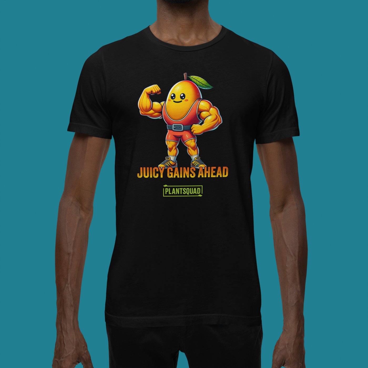 A black Plantsquad Mango "Juicy Gains Ahead" - Unisex T-Shirt featuring a muscular, anthropomorphic orange fruit character with a leaf on its head, flexing its biceps. Text below the character reads "JUICY GAINS AHEAD" with "PLANTSQUAD" in a box underneath. Perfect fitness apparel for those living a plant-based lifestyle.