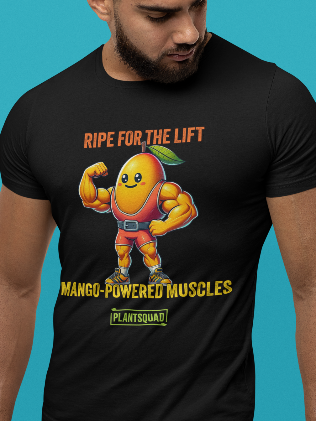 Plantsquad Mango "Ripe For The Lift Mango-Powered Muscles" - Unisex T-Shirt featuring a muscular cartoon mango character flexing its bicep. Above the character, the text reads "RIPE FOR THE LIFT," and below, "MANGO-POWERED MUSCLES." Perfect for fitness enthusiasts who embrace a vegan lifestyle. At the bottom, a green rectangle with "PLANTSQUAD" is displayed.