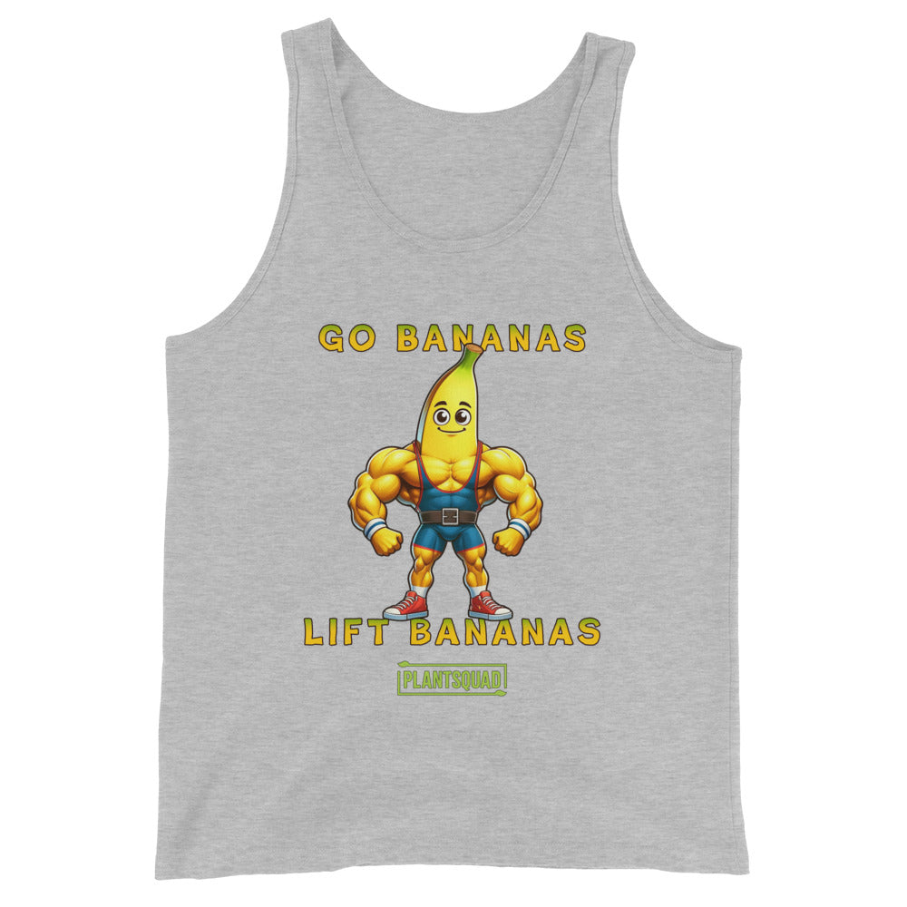 A Plantsquad Banana "Go Bananas Lift Bananas" - Unisex Tank Top featuring a cartoon banana character with a muscular body. The banana is wearing a weightlifting belt and black shorts. The text reads "GO BANANAS LIFT BANANAS" in yellow, with a small green box below containing the word "PLANTSQUAD." Perfect for gym enthusiasts embracing a plant-based lifestyle.