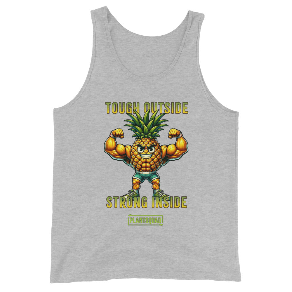 A black gym tank top features a muscular cartoon pineapple flexing its biceps and wearing a confident expression. Above the pineapple, the text reads "TOUGH OUTSIDE," and below it, "STRONG INSIDE." The bottom text says "PLANTSQUAD" enclosed within a green box. Perfect for a plant-based lifestyle! This is the Plantsquad Pineapple "Tough Outside Strong Inside" - Unisex Tank Top.