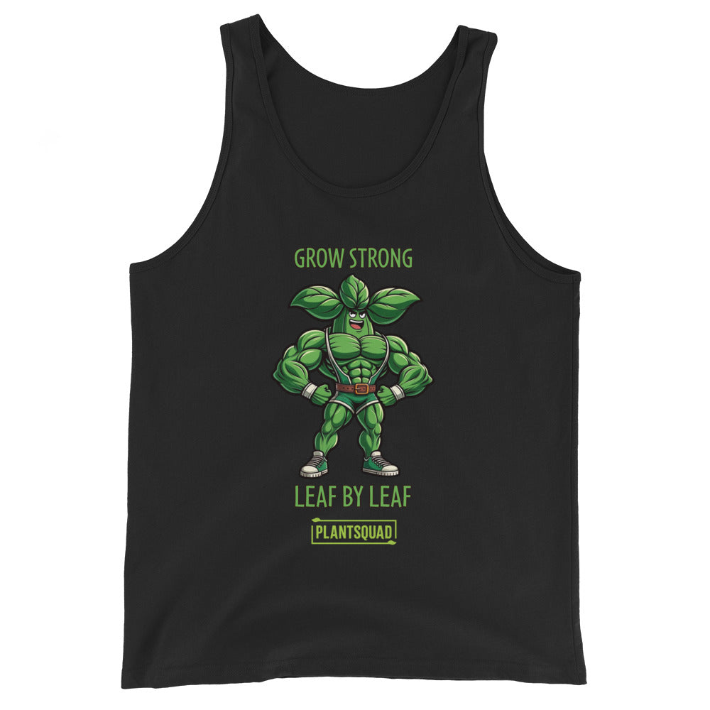 The Plantsquad Basil "Grow Strong Leaf By Leaf" - Unisex Tank Top is crafted from breathable fabric and features an illustration of a muscular green leaf character with clenched fists, wearing a belt and boots. The text above reads "GROW STRONG," and below it says "LEAF BY LEAF" and “PLANTSQUAD.” Perfect for gym enthusiasts embracing the vegan lifestyle.