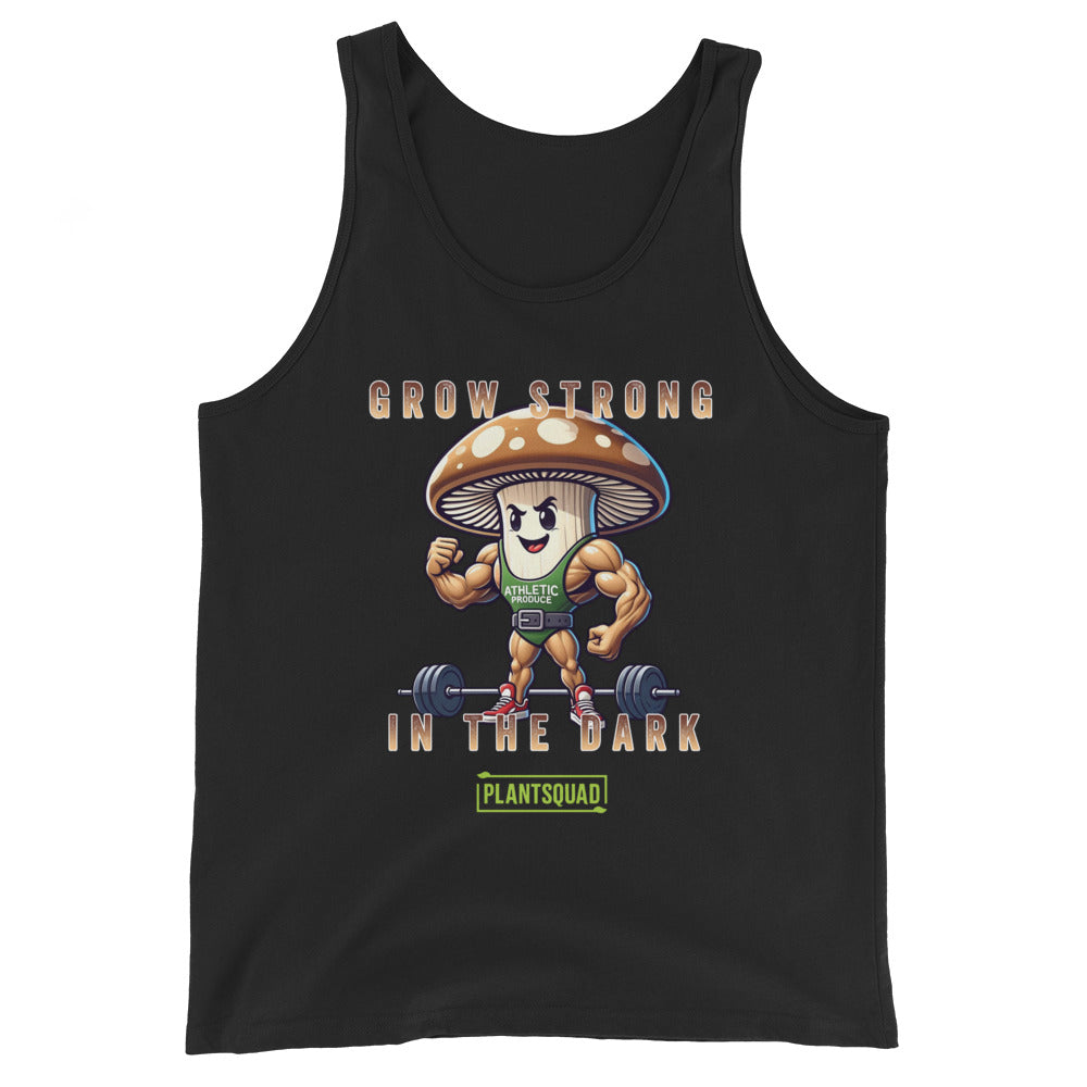 A black Plantsquad Mushroom "Grow Strong In The Dark" - Unisex Tank Top features a cartoon mushroom lifting weights with muscular arms. Text above and below the mushroom reads, "Grow Strong in the Dark - PlantSquad". Perfect for gym enthusiasts embracing a plant-based lifestyle, the mushroom sports a green athletic shirt with "ATHLETIC" on it.