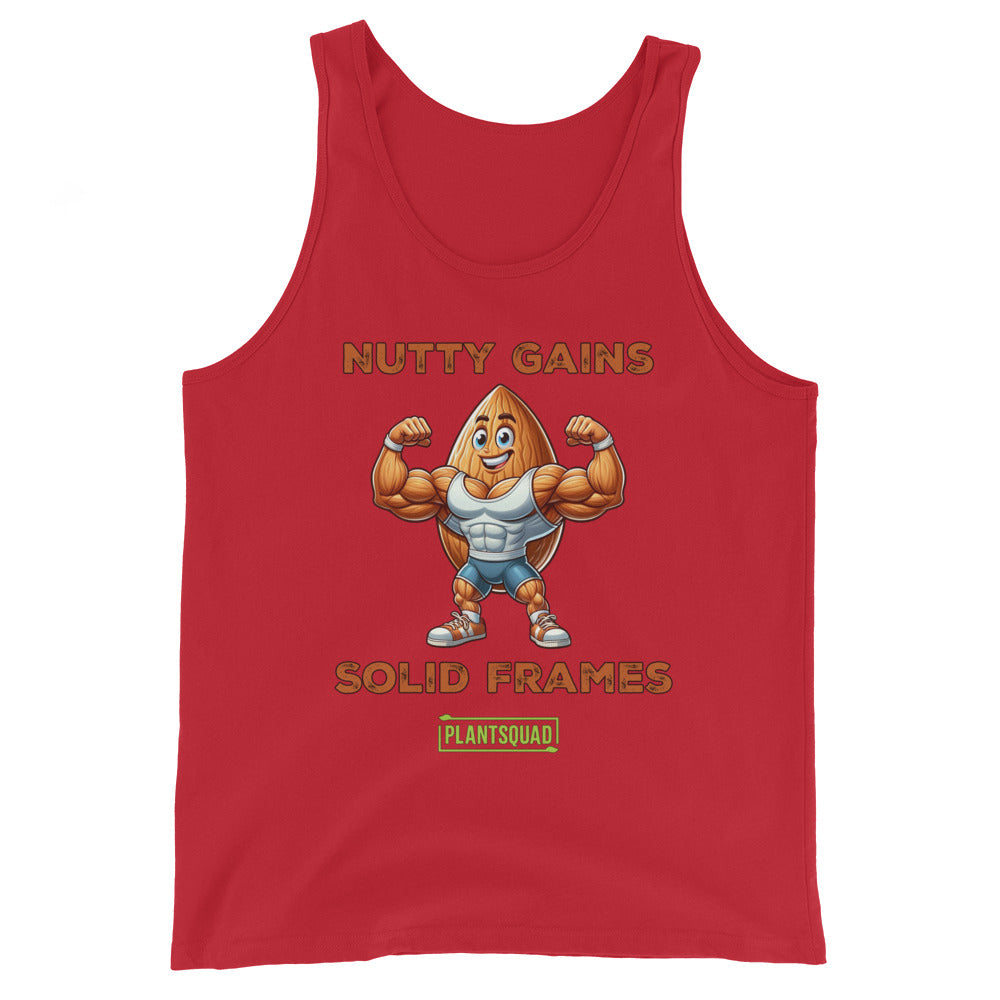 This Plantsquad Almond "Nutty Gains Solid Frames" - Unisex Tank Top features a buff, anthropomorphic almond flexing its muscles. Above it, in bold orange text, reads "NUTTY GAINS." Below, it says "SOLID FRAMES." At the bottom is a green rectangular logo with the text "PLANTSQUAD," perfect for showcasing your vegan lifestyle.