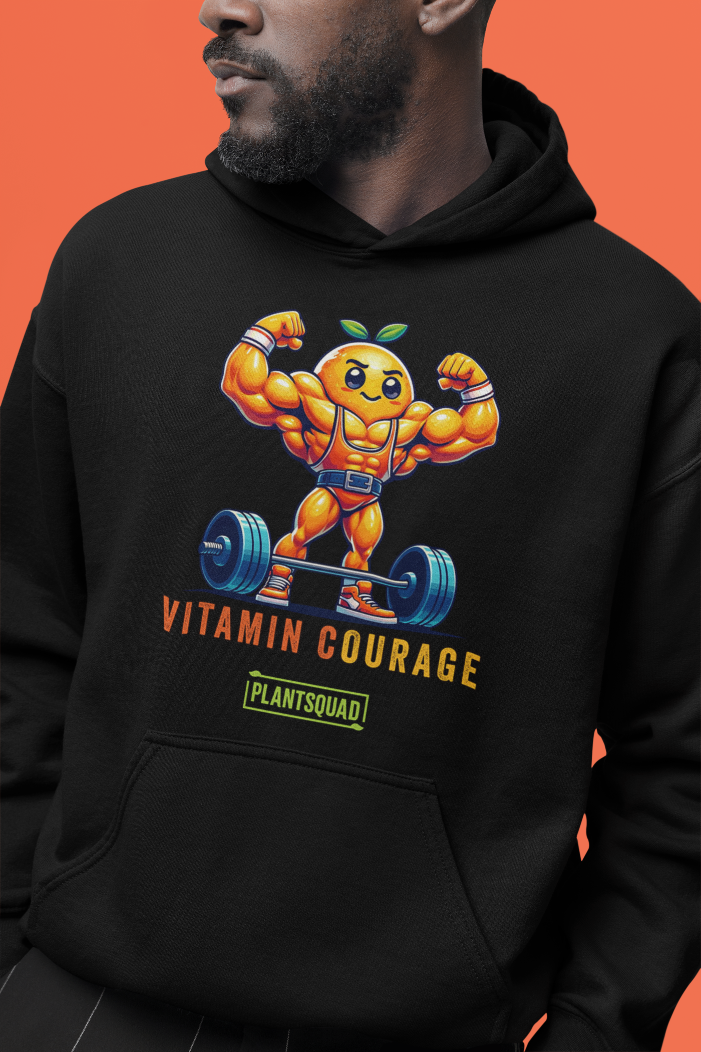 A Plantsquad Orange "Vitamin Courage" - Unisex Hoodie featuring a muscular, anthropomorphic orange lifting a barbell. The text "VITAMIN COURAGE" is written below the graphic, with "PLANTSQUAD" in a green rectangle underneath. Perfect for those embracing a vegan lifestyle.