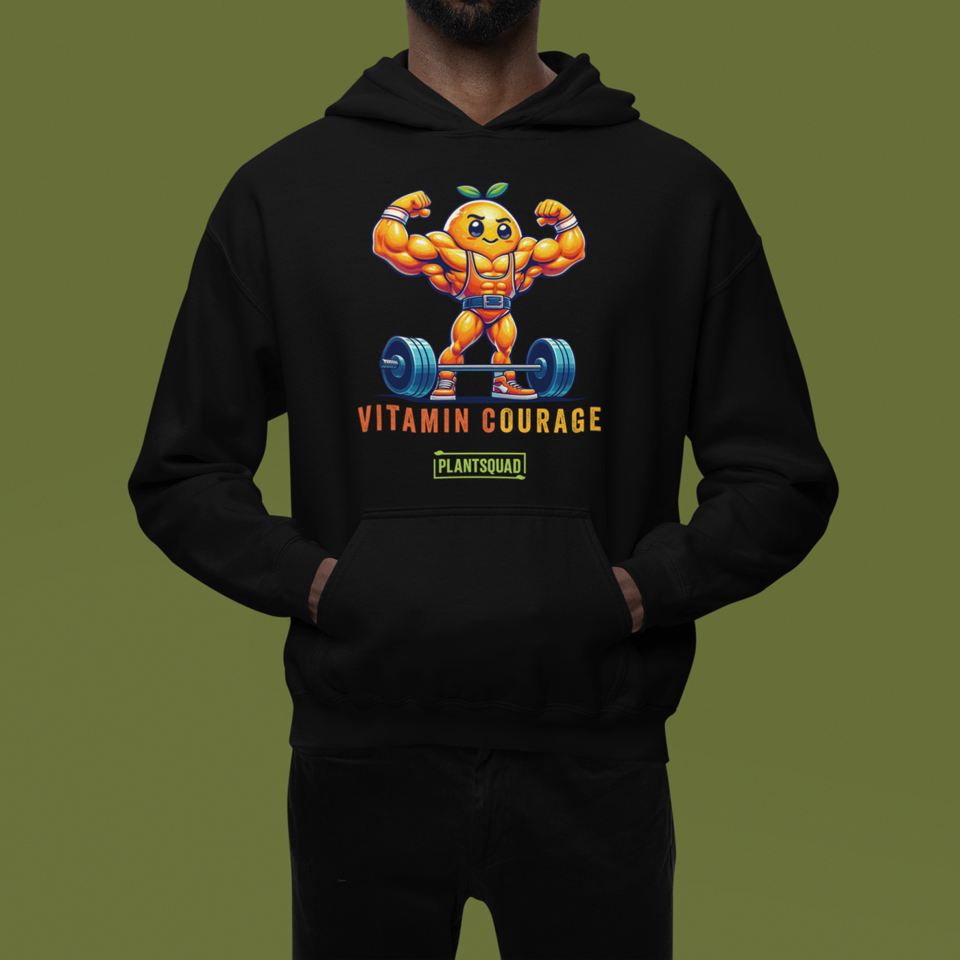 A Plantsquad Orange "Vitamin Courage" - Unisex Hoodie featuring a muscular, anthropomorphic orange lifting a barbell. The text "VITAMIN COURAGE" is written below the graphic, with "PLANTSQUAD" in a green rectangle underneath. Perfect for those embracing a vegan lifestyle.