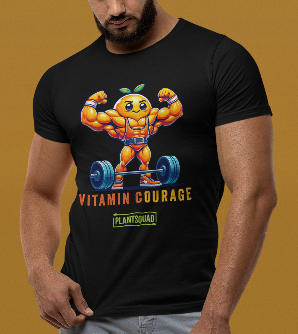 Plantsquad Orange "Vitamin Courage" - Unisex T-Shirt featuring a muscular, anthropomorphic orange lifting a barbell. The text reads "VITAMIN COURAGE" above and "PLANTSQUAD" inside a green rectangle below the image, perfect for fitness enthusiasts and those embracing a plant-based lifestyle.