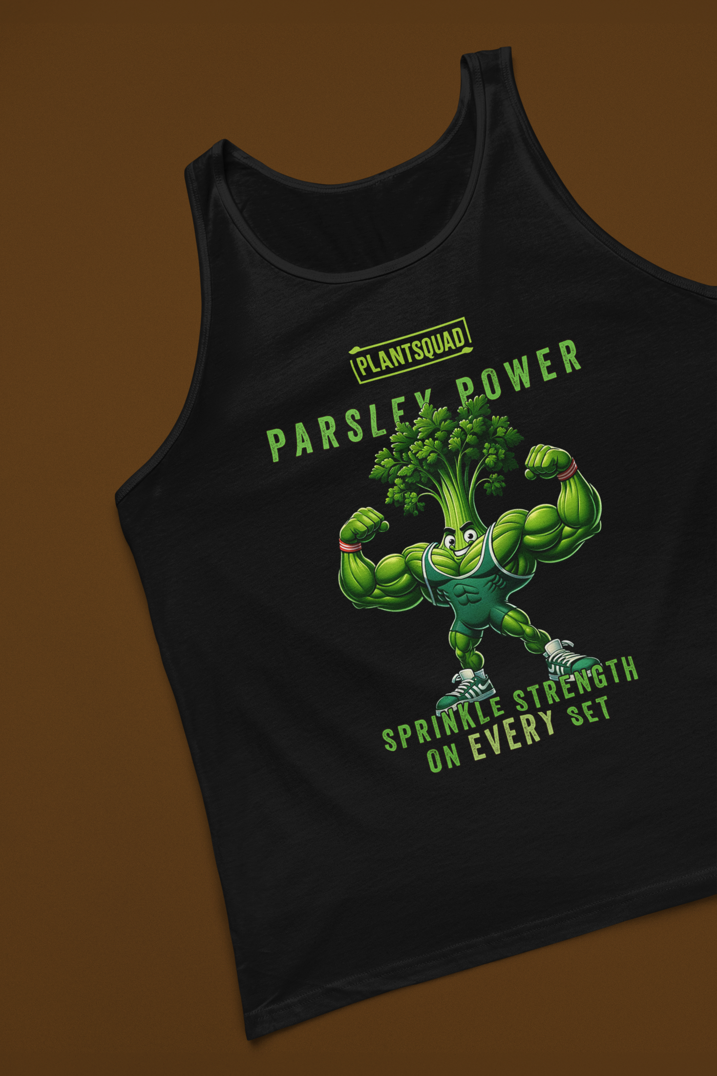 A black tank top features an illustration of a muscular anthropomorphic parsley plant flexing its biceps. Above the character, text reads "PLANTSQUAD PARSLEY POWER," and below it, the text says "SPRINKLE STRENGTH ON EVERY SET." Perfect for gym enthusiasts embracing a plant-based lifestyle, the Plantsquad Parsley "Parsley Power Sprinkle Strength On Every Set" - Unisex Tank Top is a must-have.