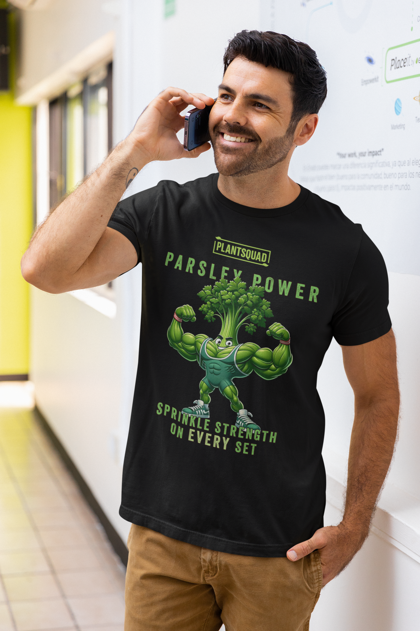 A black **Plantsquad Parsley "Parsley Power Sprinkle Strength On Every Set" - Unisex T-Shirt** featuring a muscular green cartoon parsley character flexing its arms, with the text “PLANTSQUAD PARSLEY POWER” above and “SPRINKLE STRENGTH ON EVERY SET” below it. Perfect for those embracing a vegan lifestyle!