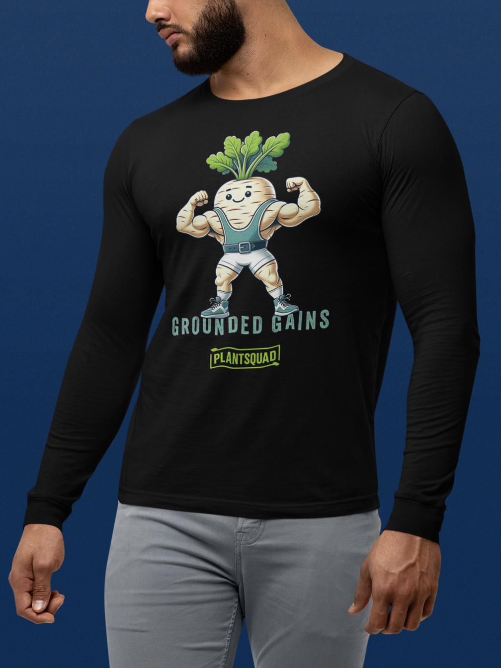 A Plantsquad Parsnip "Grounded Gains" - Unisex Long Sleeve T-Shirt features a muscular anthropomorphic parsnip flexing its biceps. The parsnip wears gym attire and has leafy greens on its head. Text below reads "GROUNDED GAINS" and "PLANTSQUAD," perfect for fitness enthusiasts embracing a vegan lifestyle.