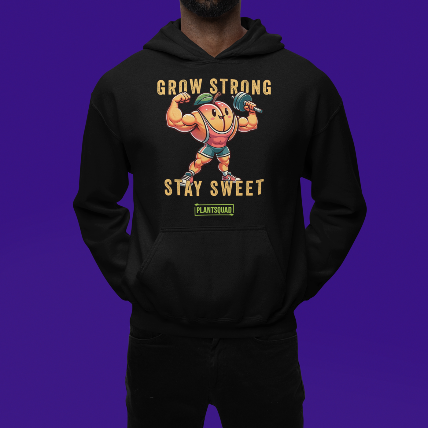 The Plantsquad Peach "Grow Strong Stay Sweet" - Unisex Hoodie features a cheerful, muscular cartoon orange lifting dumbbells. The text above and below the orange reads "Grow Strong Stay Sweet" with a small green label at the bottom that says "PLANTSQUAD." Made from cozy fabric, it's perfect for promoting a vegan lifestyle.