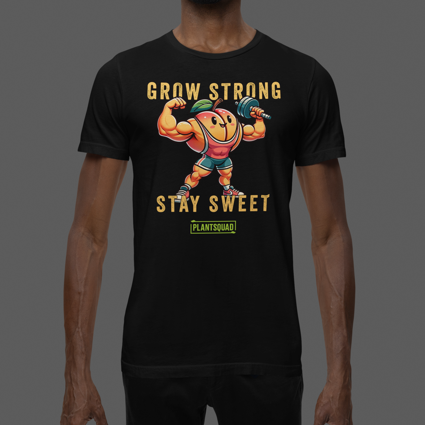 The Plantsquad Peach "Grow Strong Stay Sweet" - Unisex T-Shirt features an illustration of a muscular, anthropomorphic peach wearing a headband, wristbands, and shorts, lifting a barbell. The text above reads "GROW STRONG" and below reads "STAY SWEET" with a "PLANTSQUAD" logo at the bottom. Perfect for those embracing a plant-based lifestyle and fitness apparel.