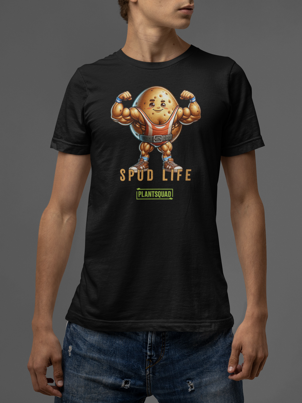 Plantsquad Potato "Spud Life" - Unisex T-Shirt: Black t-shirt featuring a muscular potato character flexing its arms, with the text "SPUD LIFE" above and "PLANTSQUAD" below. Perfect vegan t-shirt for those embracing a plant-based lifestyle and looking for unique workout apparel.