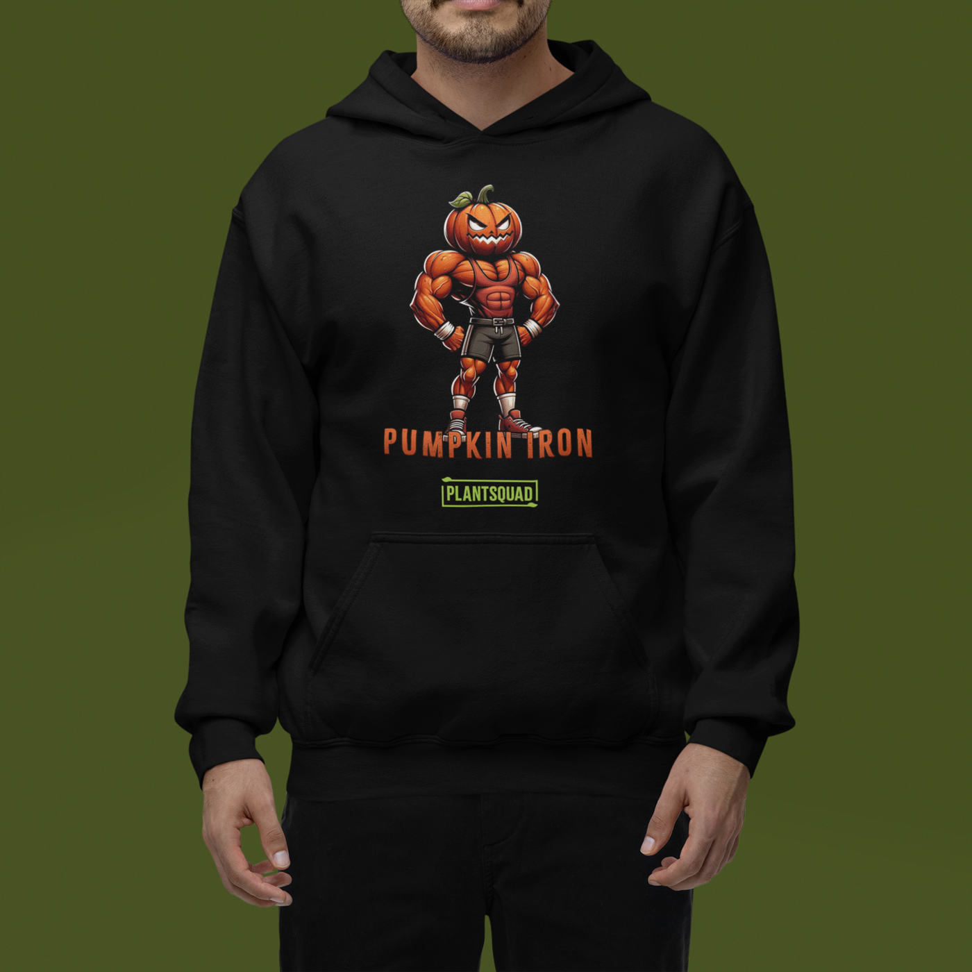 The Plantsquad Pumpkin "Pumpkin Iron" - Unisex Hoodie showcases a muscular pumpkin design, with a cartoon character flexing its muscles under the text "PUMPKIN IRON" in vibrant orange. Below, a green bar labeled "PLANTSQUAD" represents the vegan lifestyle, creating the perfect blend of fitness and plant-based living.