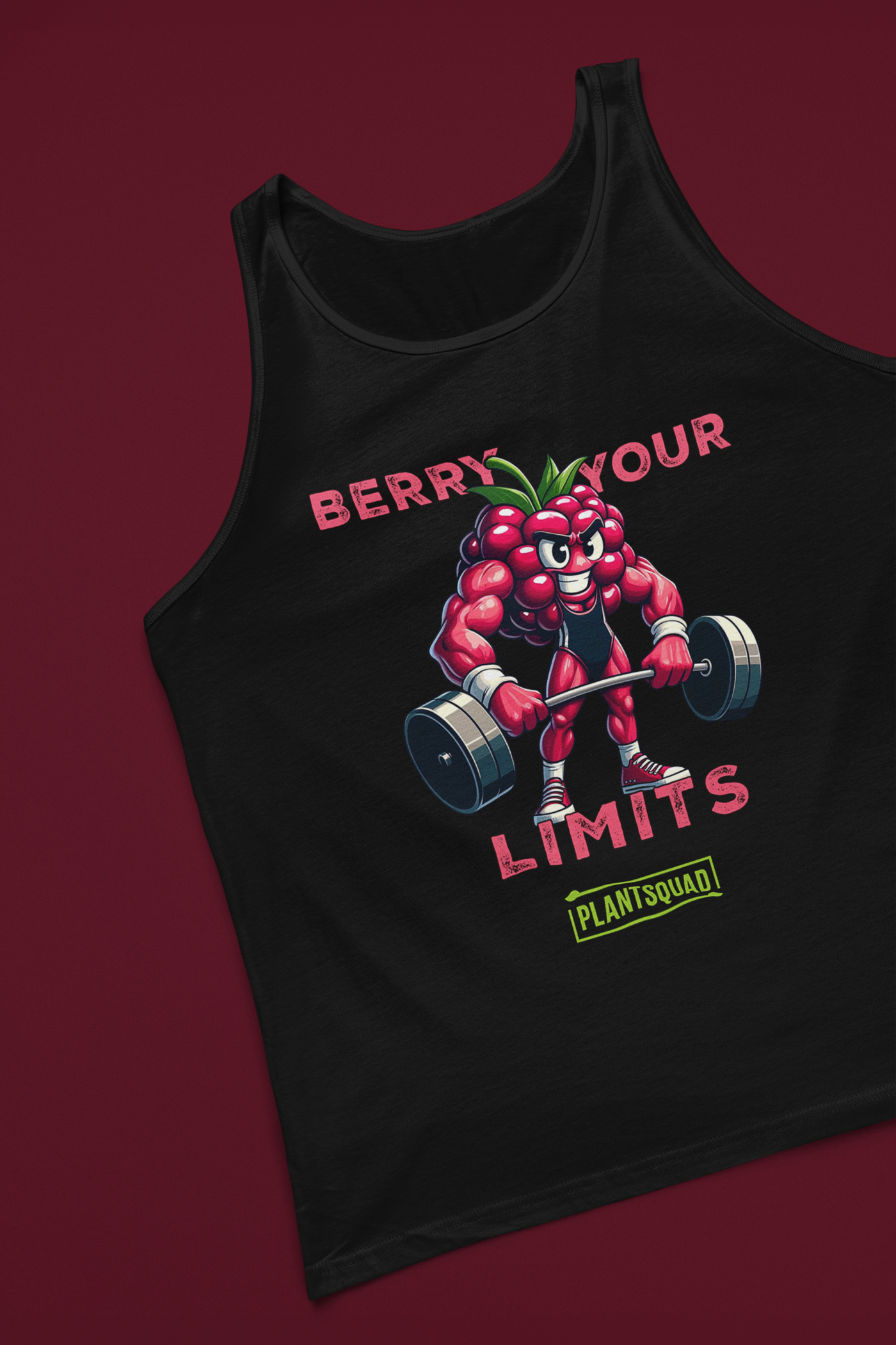 A Plantsquad Raspberry "Berry Your Limits" - Unisex Tank Top features a muscly raspberry cartoon lifting a barbell, embodying the plant-based lifestyle. The text "BERRY YOUR LIMITS" appears above the image, and "PLANTSQUAD" is displayed in a green box below the character.