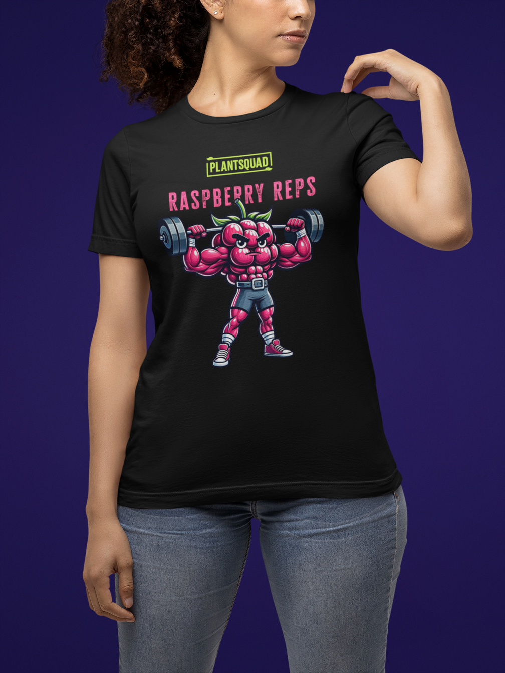 A black Plantsquad Raspberry "Raspberry Reps" - Unisex T-Shirt features a muscular raspberry lifting weights. Above the raspberry, the text reads "PLANTSQUAD" in green and "RASPBERRY REPS" in pink. The flexing raspberry character highlights vegan fitness while holding dumbbells—a perfect addition to your plant-based lifestyle collection.