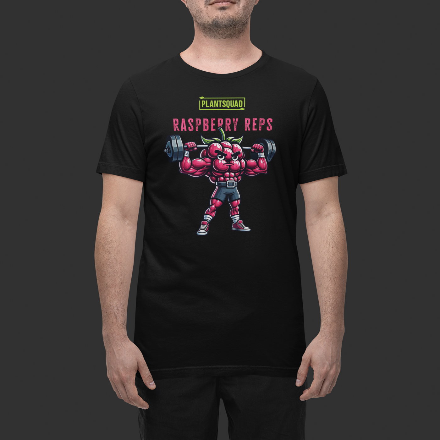 A black Plantsquad Raspberry "Raspberry Reps" - Unisex T-Shirt features a muscular raspberry lifting weights. Above the raspberry, the text reads "PLANTSQUAD" in green and "RASPBERRY REPS" in pink. The flexing raspberry character highlights vegan fitness while holding dumbbells—a perfect addition to your plant-based lifestyle collection.