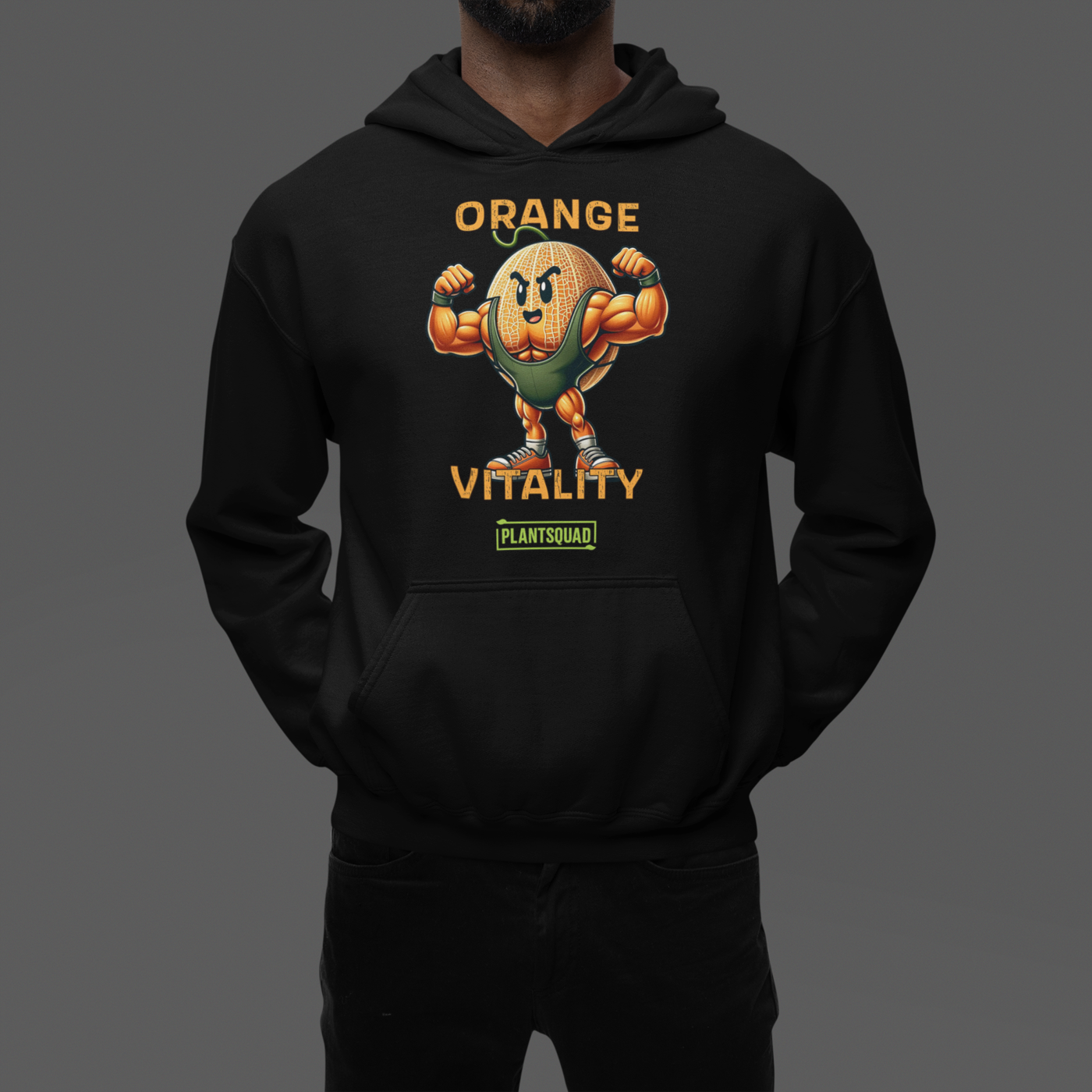 A black hooded sweatshirt boasts a muscular, cartoon orange with a fierce expression, flexing its arms. Above the orange, text reads "ORANGE VITALITY." Below it, a logo with the text "PLANTSQUAD" celebrates the vegan lifestyle. The product is called Plantsquad Rockmelon "Orange Vitality"" - Unisex Hoodie.