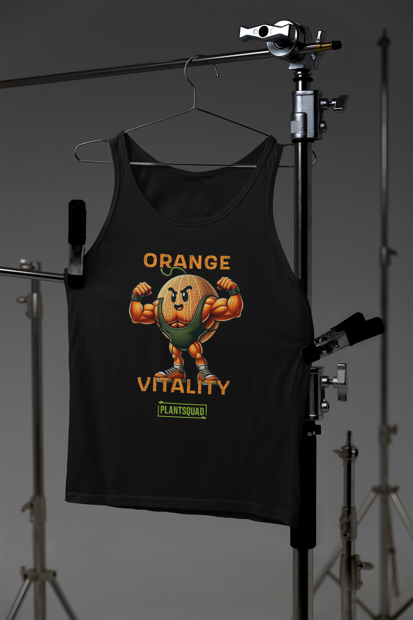 A black tank top featuring an illustrated muscular orange character flexing its arms. Above the character, the text reads "Orange Vitality" in bold orange letters, and below, a green banner with white text reads "PlantSquad." Perfect for gym enthusiasts who appreciate breathable fabric and a vegan lifestyle.

Replace with: The Plantsquad Rockmelon "Orange Vitality" - Unisex Tank Top is perfect for gym enthusiasts who appreciate breathable fabric and a vegan lifestyle.