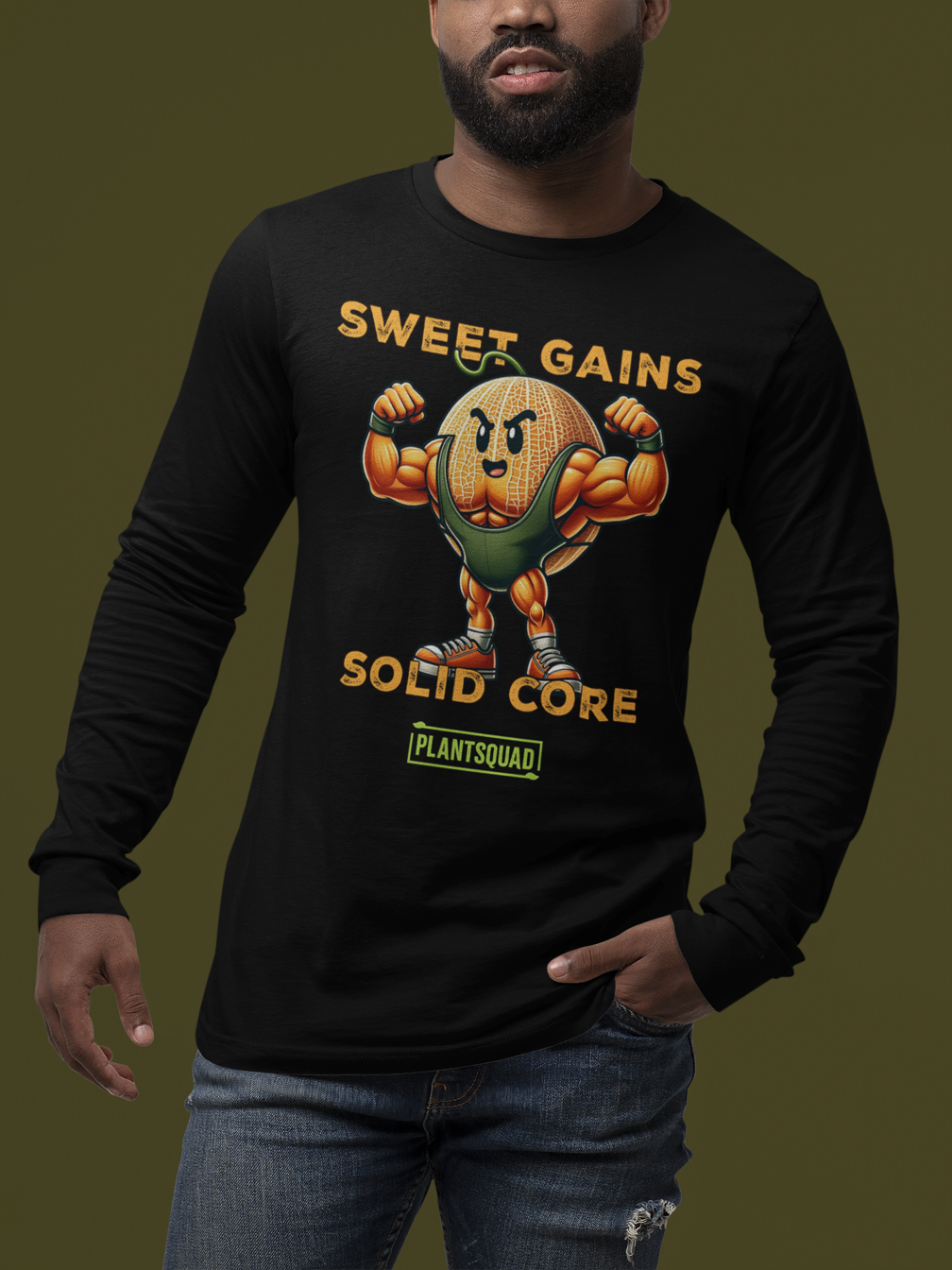 A black long-sleeve shirt features a muscular cartoon carrot flexing its arms. Above the carrot, the text reads "Sweet Gains," and below it, "Solid Core." Beneath this, "PLANTSQUAD" is printed within a green rectangular box, showcasing vegan fitness apparel for those embracing a plant-based lifestyle. The product is named Plantsquad Rockmelon "Sweet Gains Solid Core" - Unisex Long Sleeve T-Shirt.