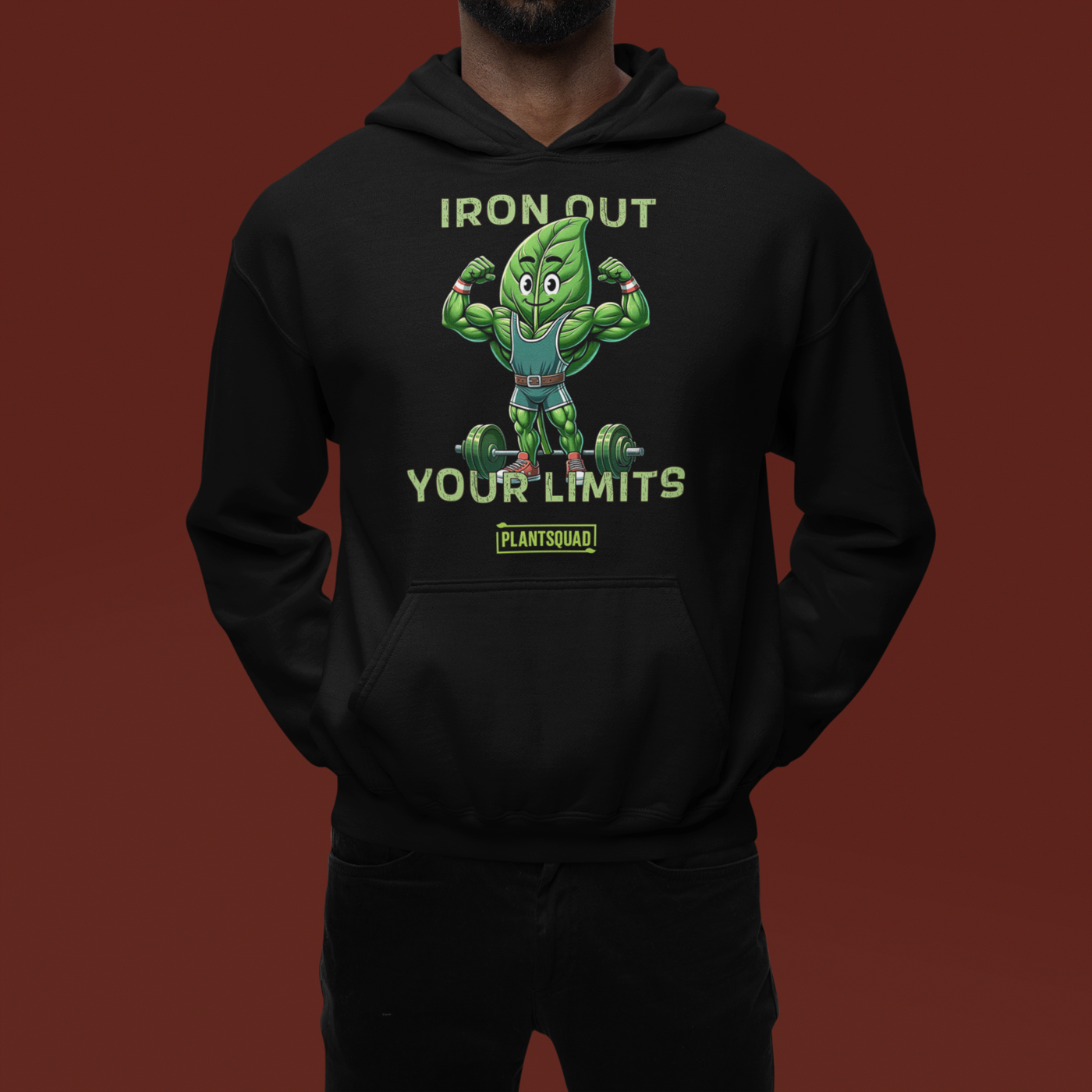 A **Plantsquad Spinach "Iron Out Your Limits" - Unisex Hoodie** features a cartoon illustration of a muscular leaf character lifting a barbell. The text above and below the character reads, "IRON OUT YOUR LIMITS," with "PLANTSQUAD" on a banner beneath, celebrating the vegan lifestyle.