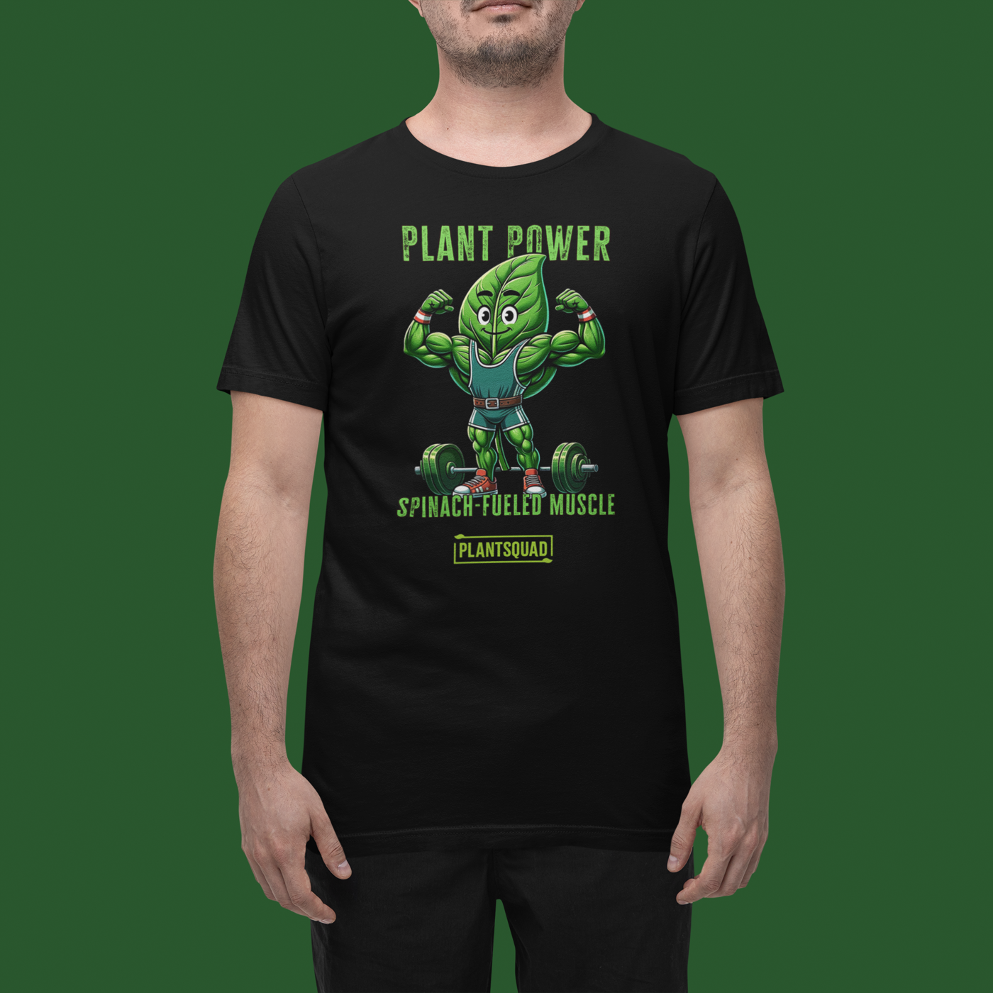 A black Plantsquad Spinach "Plant Power Spinach Fueled Muscle" - Unisex T-Shirt featuring a cartoon spinach leaf with muscular arms, wearing a green outfit and flexing next to a barbell. Perfect for fitness enthusiasts embracing the vegan lifestyle, it boasts "PLANT POWER, SPINACH-FUELED MUSCLE, #PLANTSQUAD" above and below the image.