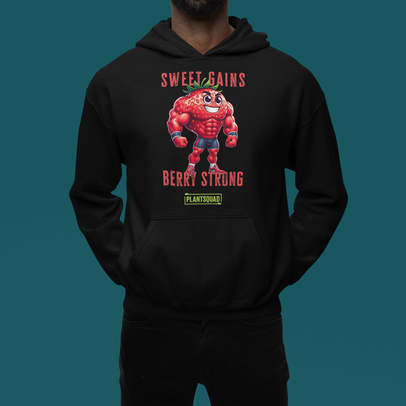 A black Plantsquad Strawberry "Sweet Gains Berry Strong" - Unisex Hoodie featuring a muscular, anthropomorphic strawberry character at the center, perfect for embracing a vegan lifestyle. Text above the strawberry reads "Sweet Gains" and below it reads "Berry Strong" with a small "PlantSquad" logo underneath. Made from cozy fabric, ideal for post-weight lifting comfort.