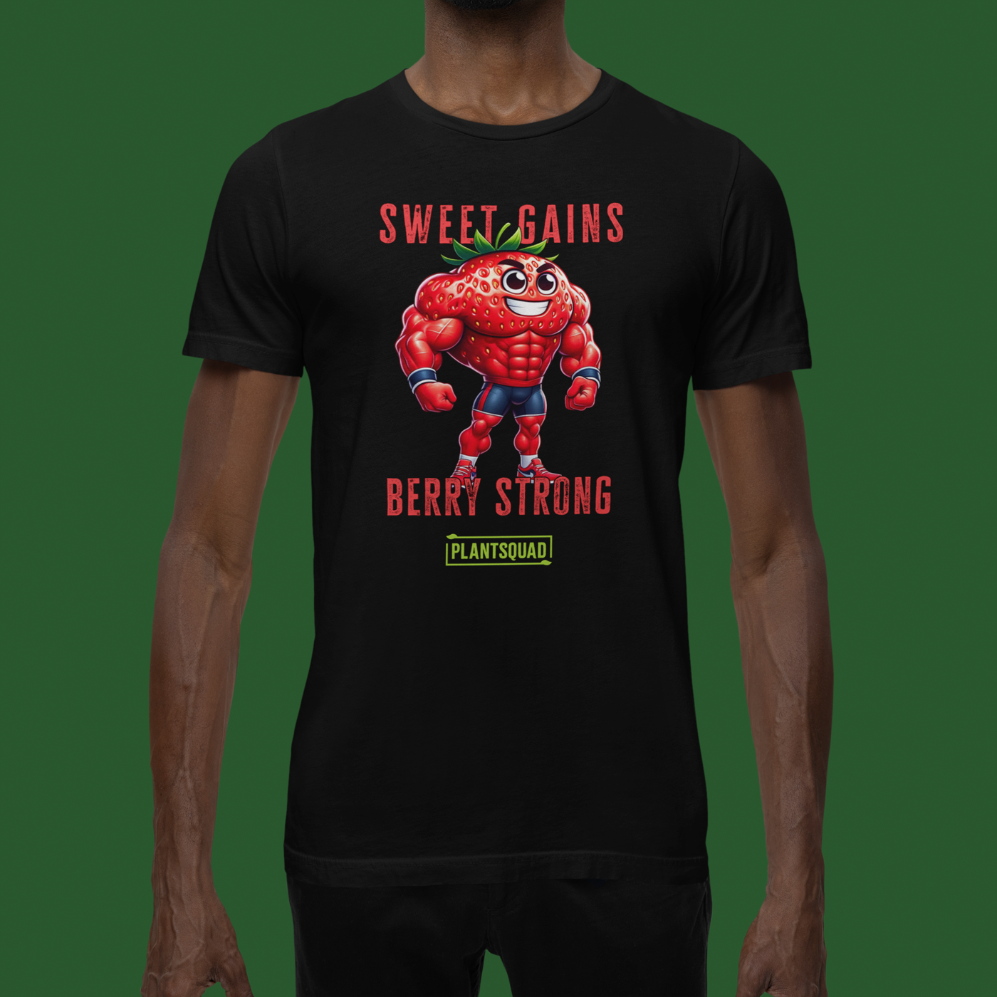 A black fitness T-shirt featuring a cartoon muscular strawberry in a superhero pose. Above the strawberry, the text reads "SWEET GAINS," and below it, "BERRY STRONG." Perfect for those embracing a vegan lifestyle, it sports a green logo with the word "PLANTSQUAD" at the bottom is called **Plantsquad Strawberry "Sweet Gains Berry Strong" - Unisex T-Shirt**.