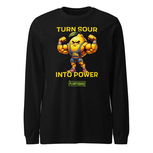 A black long-sleeve shirt features a muscular, anthropomorphic lemon with bulging arms flexed. Above and below the lemon are the phrases "TURN SOUR INTO POWER" in bold yellow letters, promoting a vegan lifestyle. The label "Plantsquad Lemon 'Turn Sour Into Power' - Unisex Long Sleeve T-Shirt" at the bottom aligns perfectly with fitness enthusiasts.