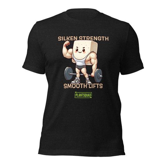 A black Plantsquad Tofu "Silken Strength Smooth Lifts" - Unisex T-Shirt featuring a muscly tofu cartoon character lifting weights. The text reads "Silken Strength" above the character and "Smooth Lifts" below. A green label with "PLANTSQUAD" at the bottom celebrates your plant-based lifestyle.