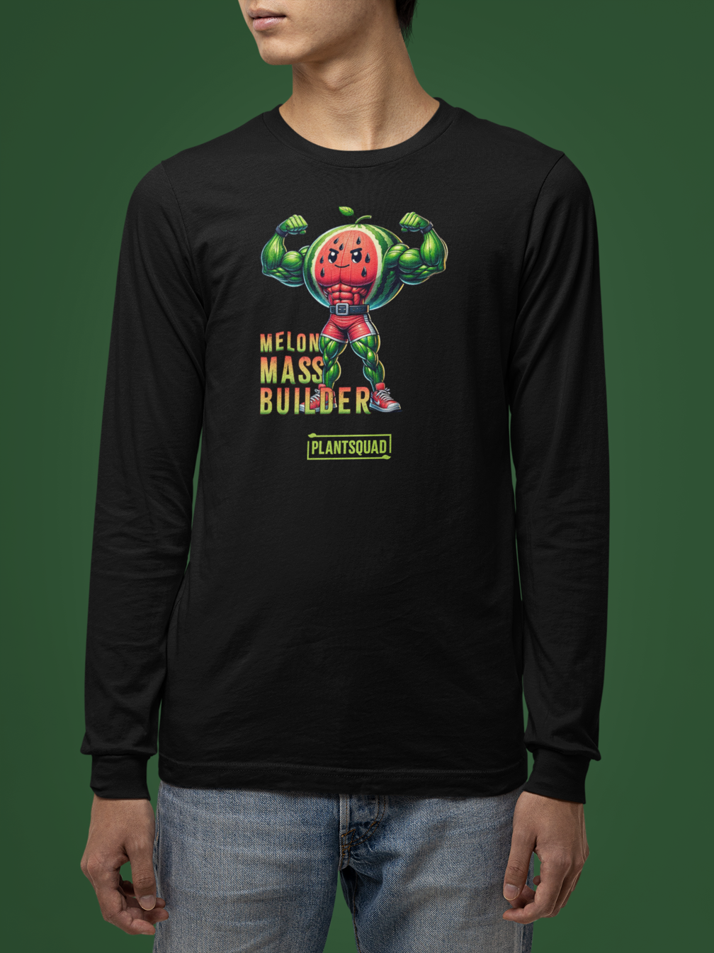 A Plantsquad Watermelon "Melon Mass Builder" - Unisex Long Sleeve T-Shirt featuring a muscular cartoon character with a watermelon head, flexing its arms. Perfect for fitness enthusiasts embracing the vegan lifestyle, the text "MELON MASS BUILDER" in red and yellow is printed next to the character, with "PLANTSQUAD" beneath it in green.